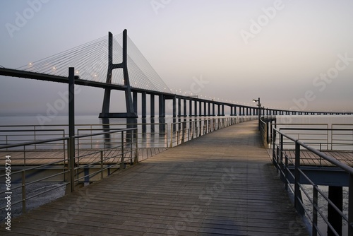 Beautiful sunrise over the historic Vasco da Gama bridge in Lisbon  Portugal