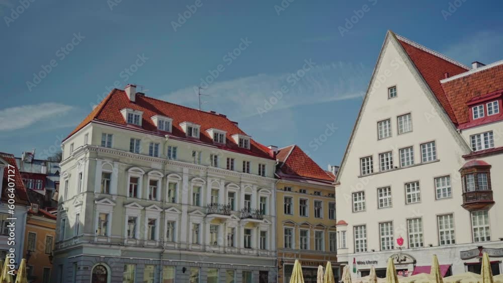 Tallinn Town Hall Square. A panning view of old houses on the Town Hall Square in Tallinn Old Town, Capital of Estonia. Tallinn Town Hall Square. A panning view of old houses on the Town Hall Square in Tallinn Old Town, Capital of Estonia.