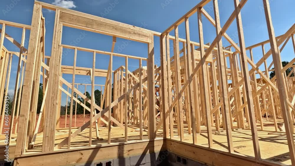 Construction frame house of wooden beam stick framework on new build home