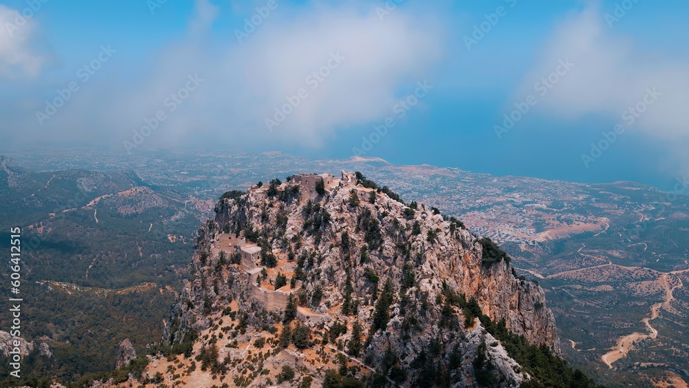 Buffavento Castle in Kyrenia, North Cyprus on sunny day with cloudy sky