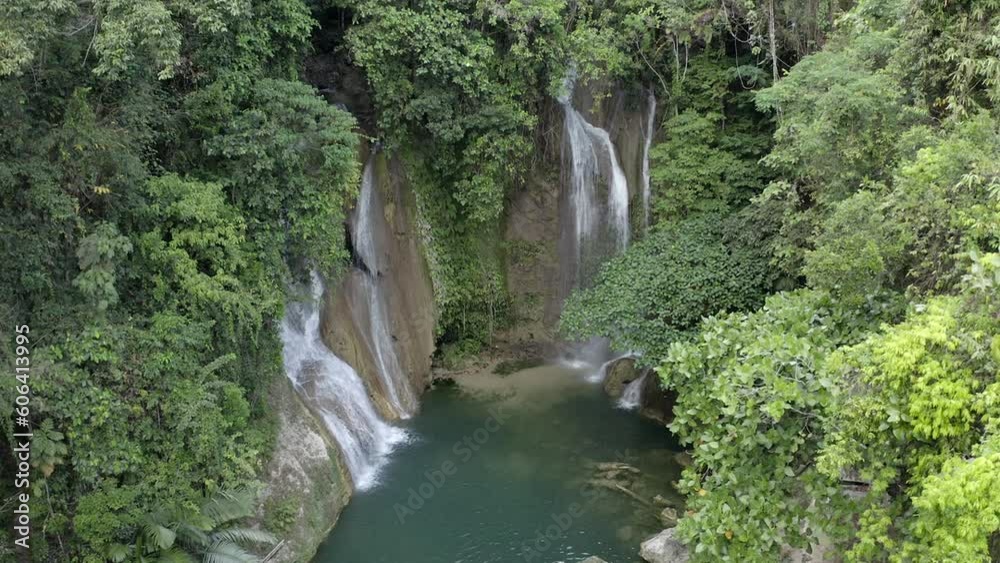 Drone view of a wild waterfall in the woods Drone view of a wild waterfall in the woods