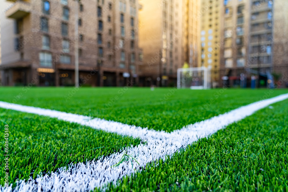 Soccer field at the school stadium in residential area. Outer line in