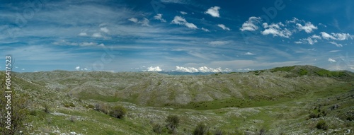 Panoramic view of a landscape with mountain against a cloudy sky in North Macedonia