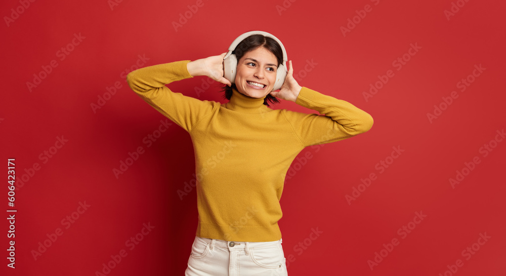Fototapeta premium Excited woman listening to music