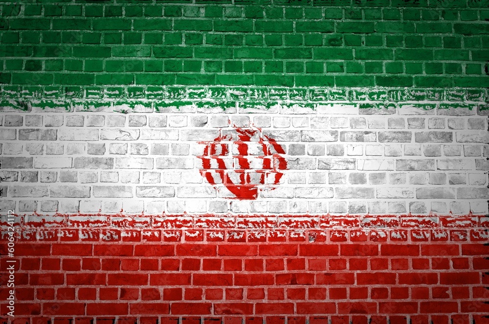 Shot of the Iran flag painted on a brick wall in an urban location Shot of the Iran flag painted on a brick wall in an urban location