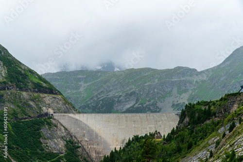 K?lnbreinsperre, Austria - August 02 2021: View of K?lnbrein-Staumauer the tallest dam in Austria at Malta Hochalmstra?e-K?lnbreinsperre in Carinthia with people