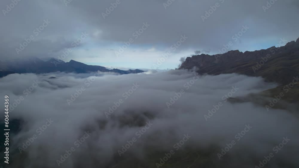 Low clouds in the mountains. Aerial view of low fog in mountainous area Low clouds in the mountains. Aerial view of low fog in mountainous area