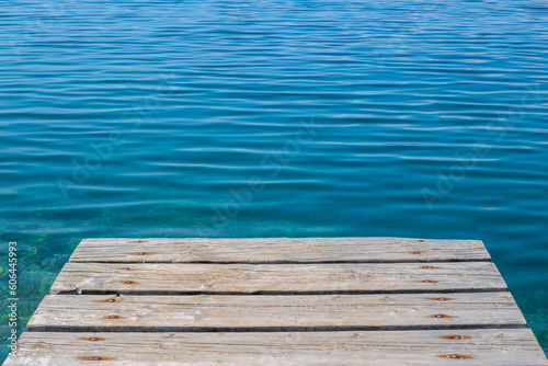 wooden pontoon above the sea surface