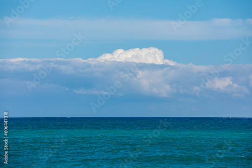 Fototapeta Naklejka Na Ścianę i Meble -  blue sky and sea with large clouds