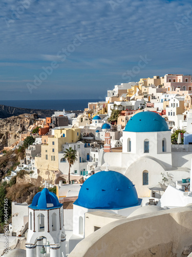 Iconic views of blue domes and white buildings in Santorini, Greece
