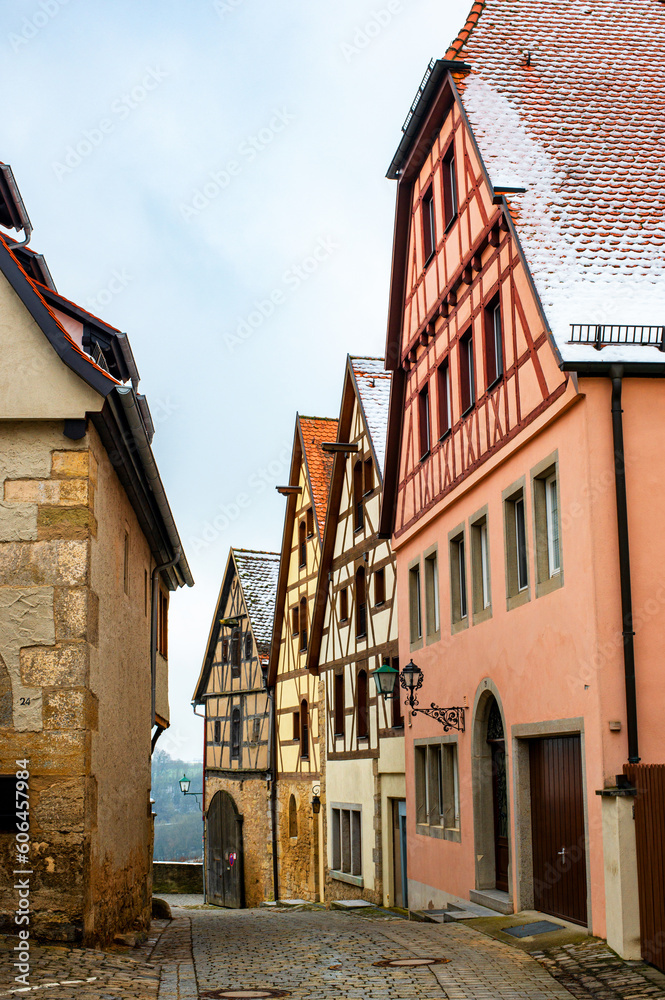 Colourful street of Rothenburg ob der Tauber, the Franconia region of Bavaria, Germany. Medieval old town. The most romantic town in Germany.