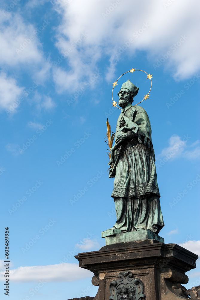 Statue of a saint on Charles bridge in Prague