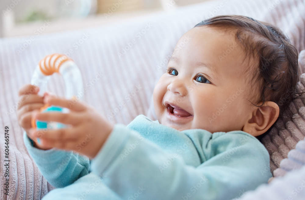 Φωτογραφία Happy baby, rattle and child in bedroom for childhood development, growth and cute smile at home