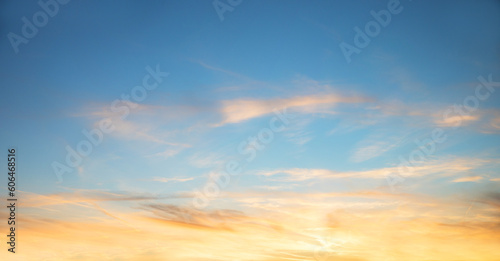 sunset scenery with yellow shiny sky below and blue above