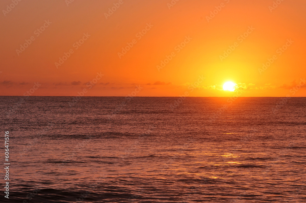 Cumuruxatiba, Brazil  Sunset on the Bahia coastal beach at the end of the day sand and sea