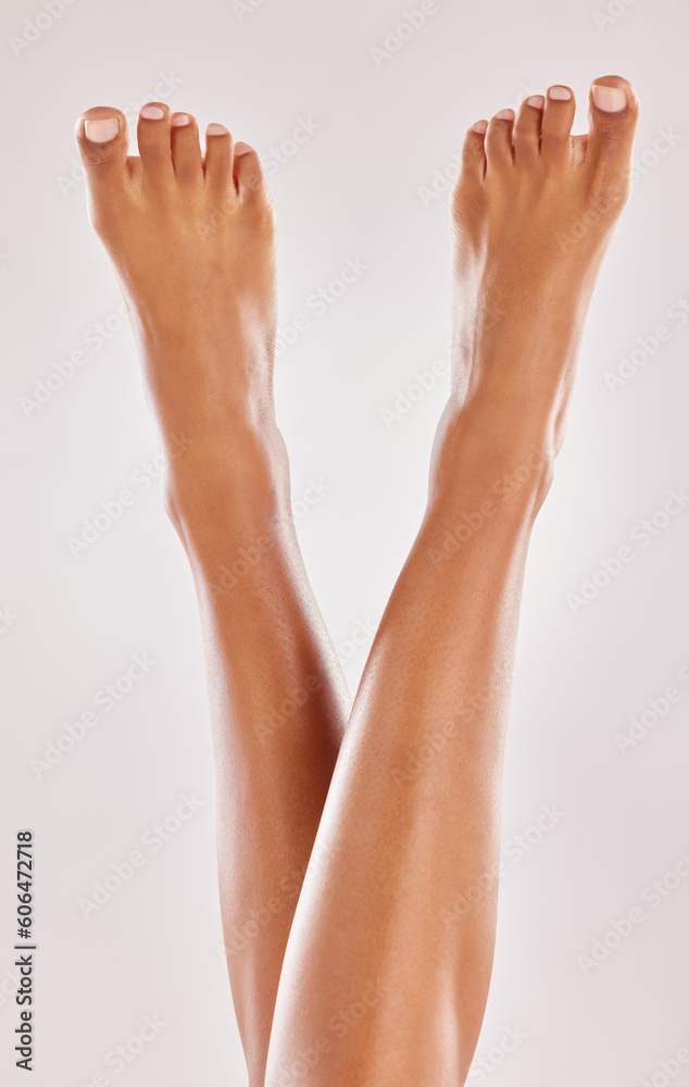 Woman, legs and feet with beauty and skin, hair removal and pedicure isolated on studio background. Body, skincare and female model with dermatology and grooming, epilation and cosmetic treatment Woman, legs and feet with beauty and skin, hair removal and pedicure isolated on studio background. Body, skincare and female model with dermatology and grooming, epilation and cosmetic treatment