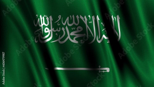 The graceful fluttering of the Kingdom of Saudi Arabia flag as it dances in the gentle breeze.  photo