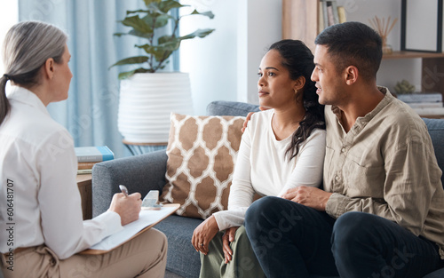 Couple on sofa, therapist and counselling for support, love and help with relationship advice together. Man, woman and psychologist in conversation, healthy communication and healing marriage therapy