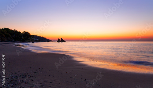 Long exposure photo of sunset over the sea beach