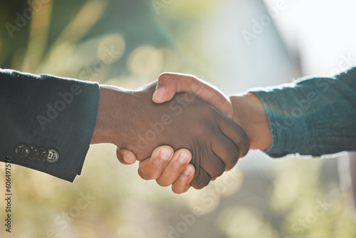 Thank you, men shaking hands for agreement and networking with a lens flare. Welcoming or partnership. job promotion or deal for business and people together with handshake for greeting or hired