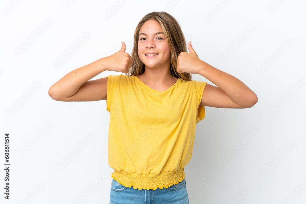 Little caucasian girl isolated on white background giving a thumbs up gesture