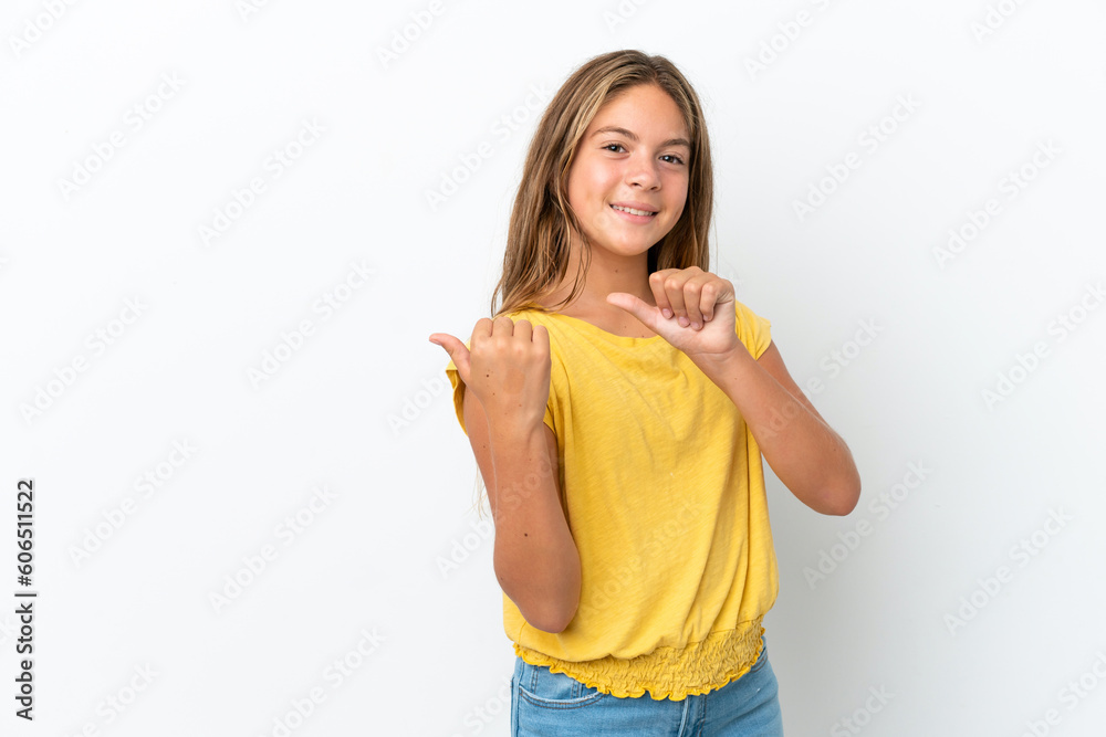 Little caucasian girl isolated on white background pointing to the side to present a product Little caucasian girl isolated on white background pointing to the side to present a product