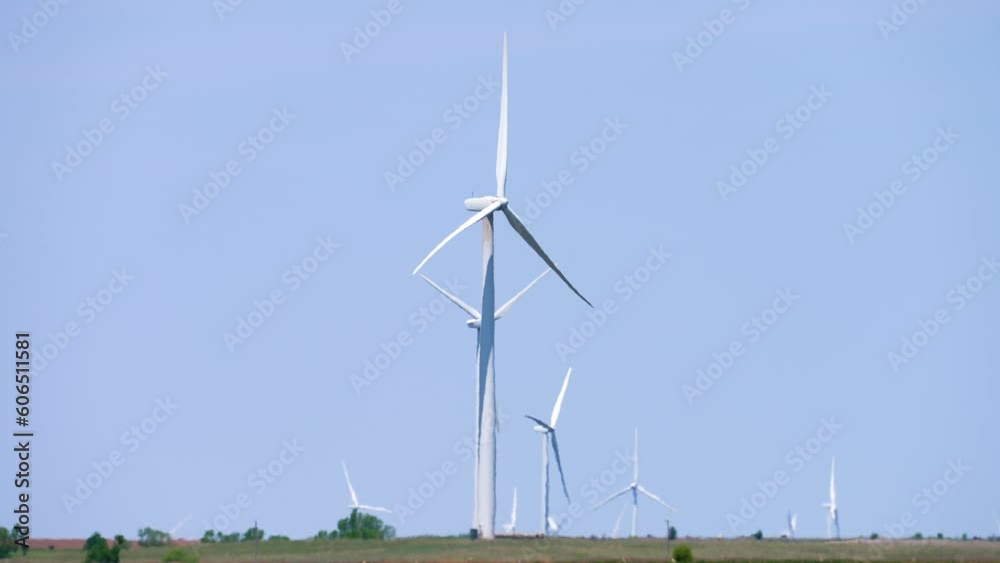 medium shot of wind turbines on a prairie pasture medium shot of wind turbines on a prairie pasture