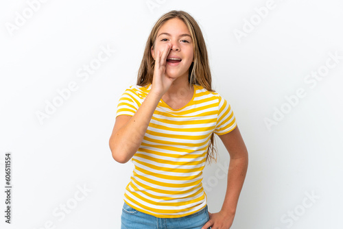 Little caucasian girl isolated on white background shouting with mouth wide open