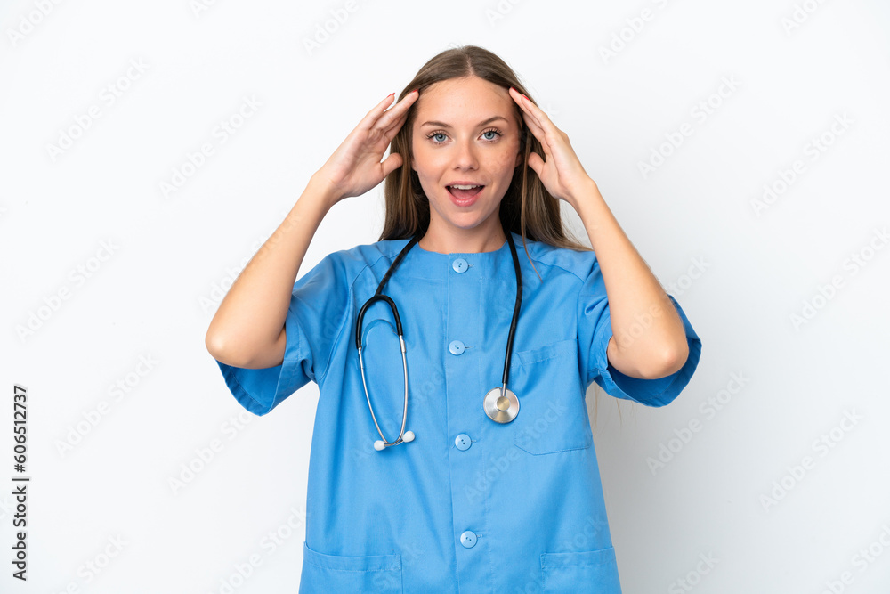 Young surgeon doctor Lithuanian woman isolated on white background with surprise expression Young surgeon doctor Lithuanian woman isolated on white background with surprise expression