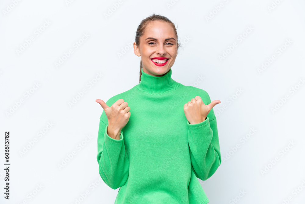 Young caucasian woman isolated on white background with thumbs up gesture and smiling Young caucasian woman isolated on white background with thumbs up gesture and smiling