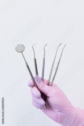 dentist doctor's tool in woman's hand