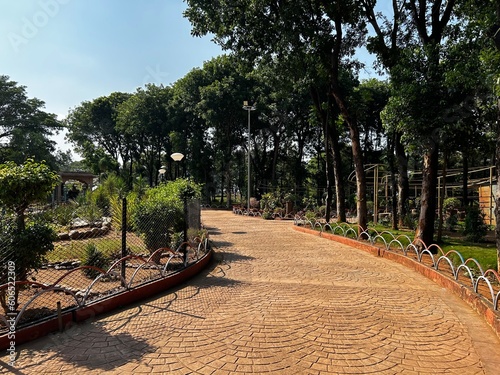 Toy train and the tracks in between the garden from Hyderabad, India photo