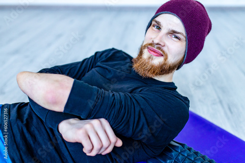 handsome man warm up and stay strong at home workout