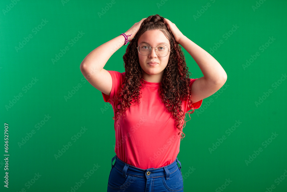 Teenager with red curly hair, wearing jeans, shirt, glasses and with various facial expressions of feelings