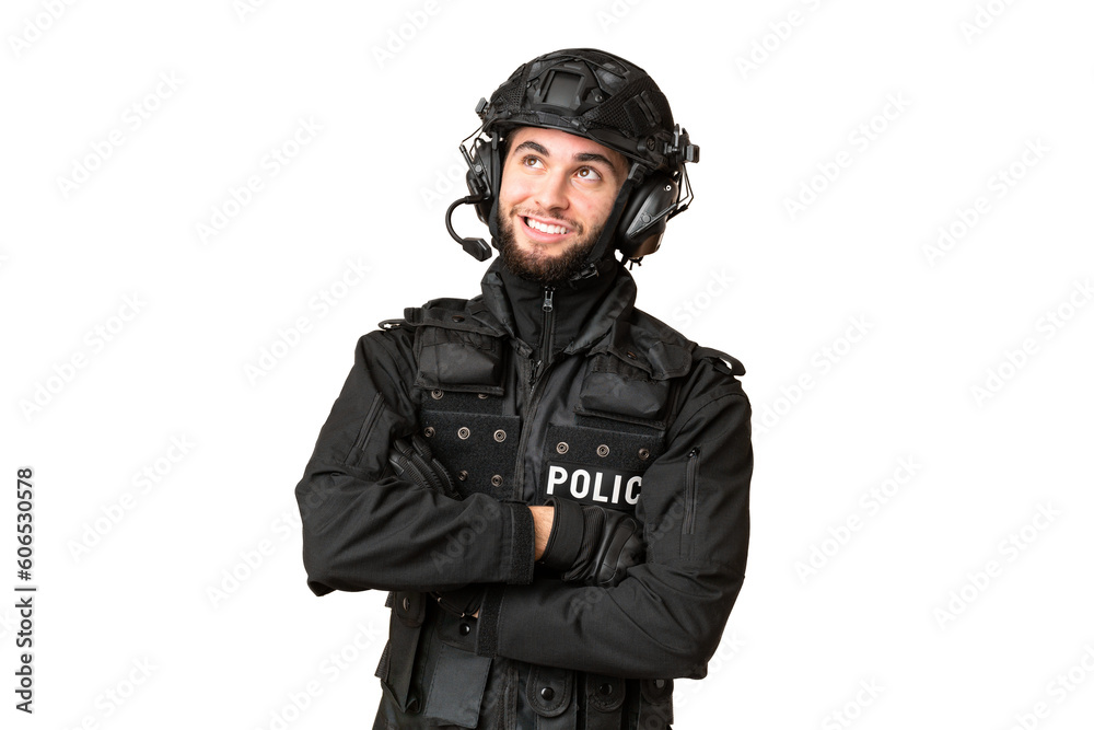 SWAT over isolated chroma key background looking up while smiling SWAT over isolated chroma key background looking up while smiling