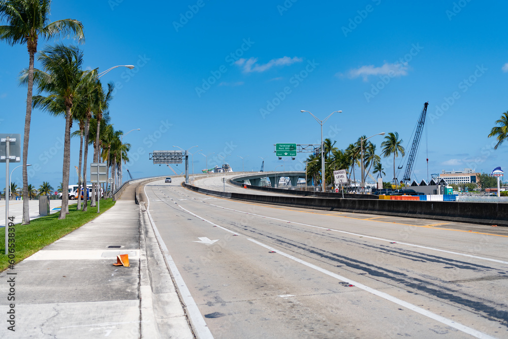summer empty bridge route with palms and blue sky summer empty bridge route with palms and blue sky