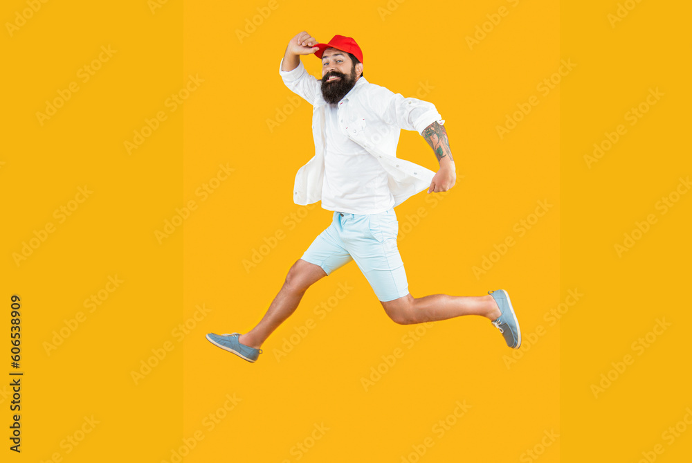 hurrying man deliveryman on background. full length photo of hurrying man deliveryman jumping