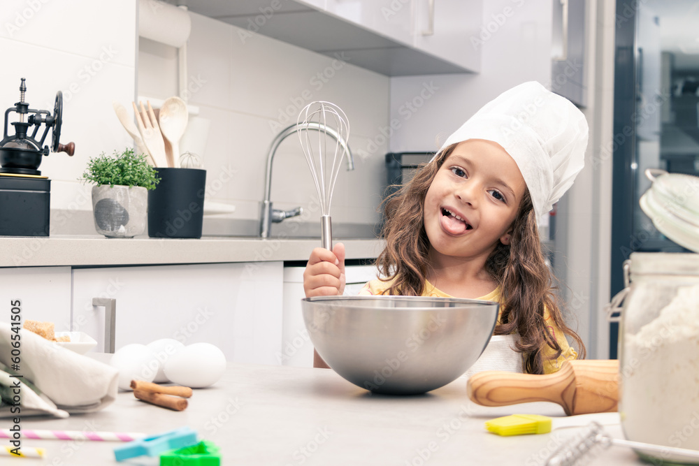 Sweet Moments: Girl preparing delicious cakes in cozy kitchen Sweet Moments: Girl preparing delicious cakes in cozy kitchen