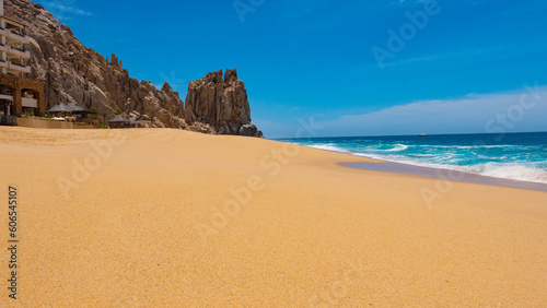 rocky sandy beach seaside with mountain. rocky beach seaside with water waves.