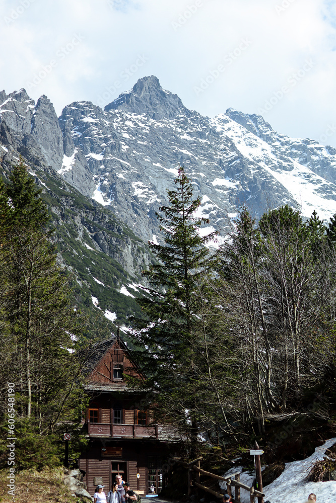 Twilight Haven: Snow-Dusted Mountain Slopes, Enchanting Forest, and Village Delight (Tatra Mountains, Morskie Oko Lake). Twilight Haven: Snow-Dusted Mountain Slopes, Enchanting Forest, and Village Delight (Tatra Mountains, Morskie Oko Lake).
