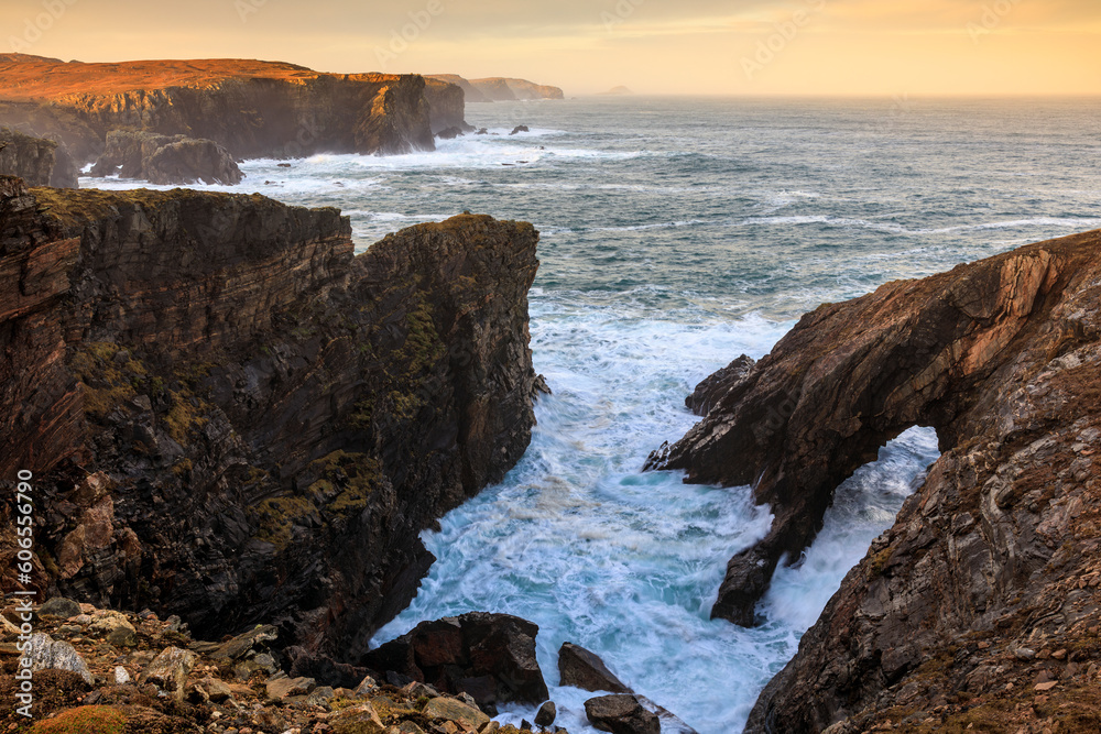 The rocky coastline of Dail Beag at sunrise, close to  the famous Stac a Phris natural sea arch, Isle of Lewis, Scotland 
