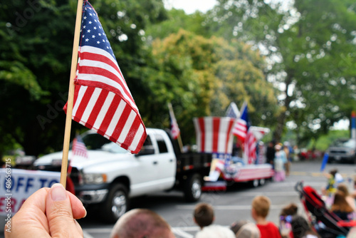 Waving an American flag at the Independence Day Parade on the 4th of July 