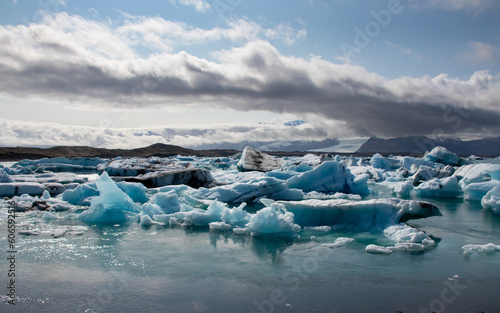 Glacier lagoon in Iceland with blue sky and ice floes in the water