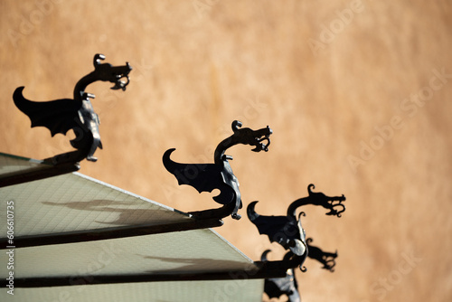 dragons on side of building
