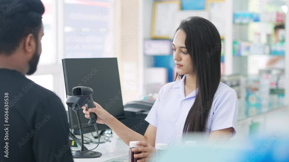 Medical pharmacy and healthcare business concept. Indian woman pharmacist checking medical product, medicine and supplements in stock by scan barcode on package at cashier counter in modern drugstore. Medical pharmacy and healthcare business concept. Indian woman pharmacist checking medical product, medicine and supplements in stock by scan barcode on package at cashier counter in modern drugstore.