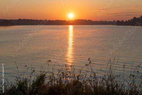 Bright July sunrise on the Volga river. Tver region  Russia