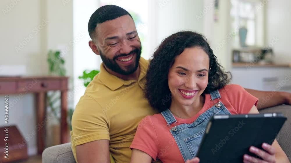 Happy, couple relax and laughing at tablet email, streaming movie or video on the living room sofa. Smile, showing and a man and woman with a funny film, internet results or notification at home Happy, couple relax and laughing at tablet email, streaming movie or video on the living room sofa. Smile, showing and a man and woman with a funny film, internet results or notification at home