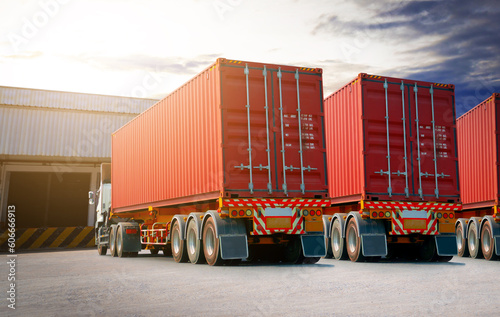 Semi Trailer Trucks on The Parking Lot. Trucks Loading at Dock Warehouse. Shipping Cargo Container Delivery Trucks. Distribution Warehouse. Freight Trucks Cargo Transport. Warehouse Logistics.