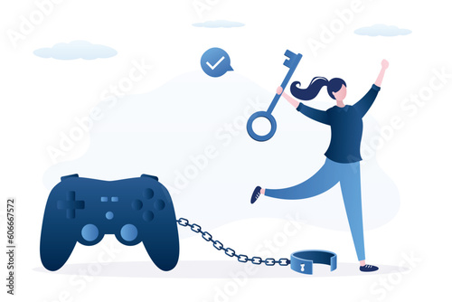 Happy woman with big key. Female player opened shackles and got rid of gambling addiction. Gamer girl is not chained to huge joystick. Problem of addiction to esports and online games.