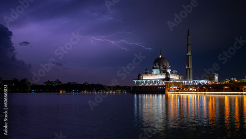 Lightning strikes during thunder storm over Putrajaya Putra Mosque at night © MuhammadSyafiq